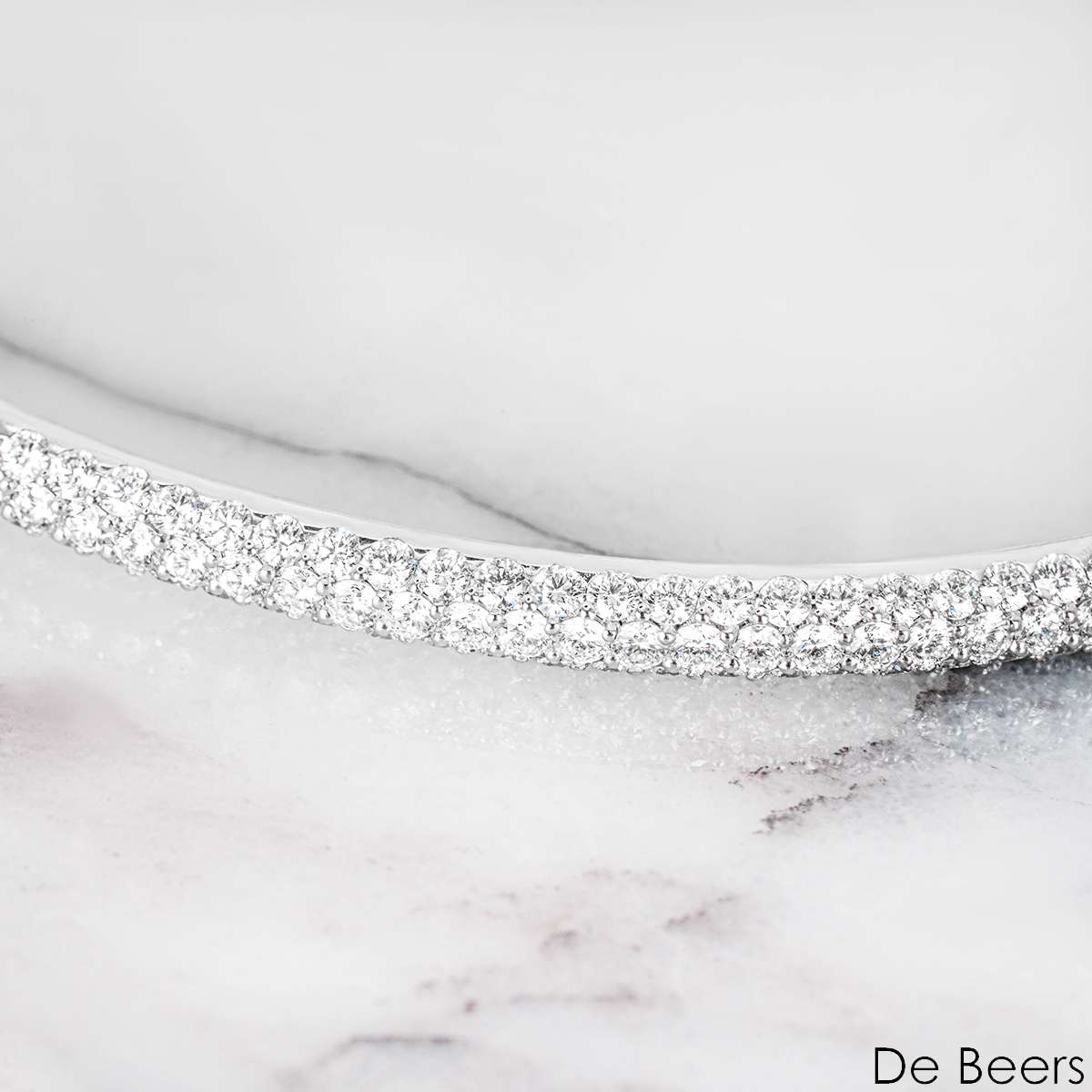 De Beers White Gold Classic Diamond Three Row Bangle B102120 De Beers White Gold Classic Diamond Three Row Bangle B102120